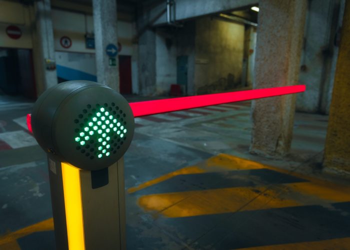 A view of a sign with an illuminated up arrow applied on the barrier